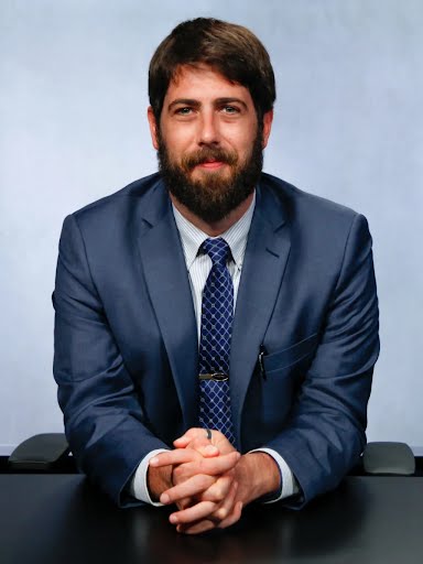 Portrait of Alex Newman
